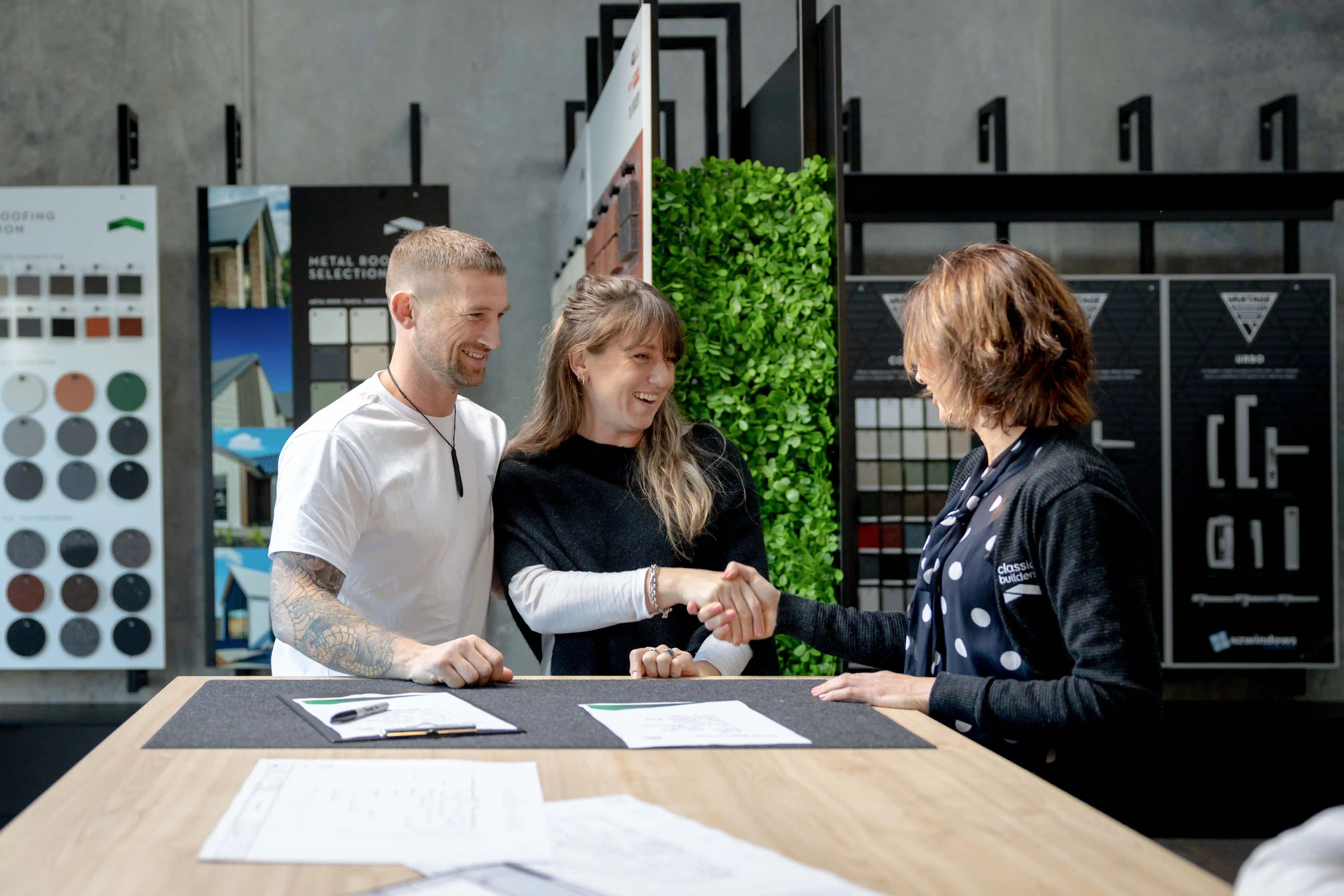 Clients meet with sales consultant