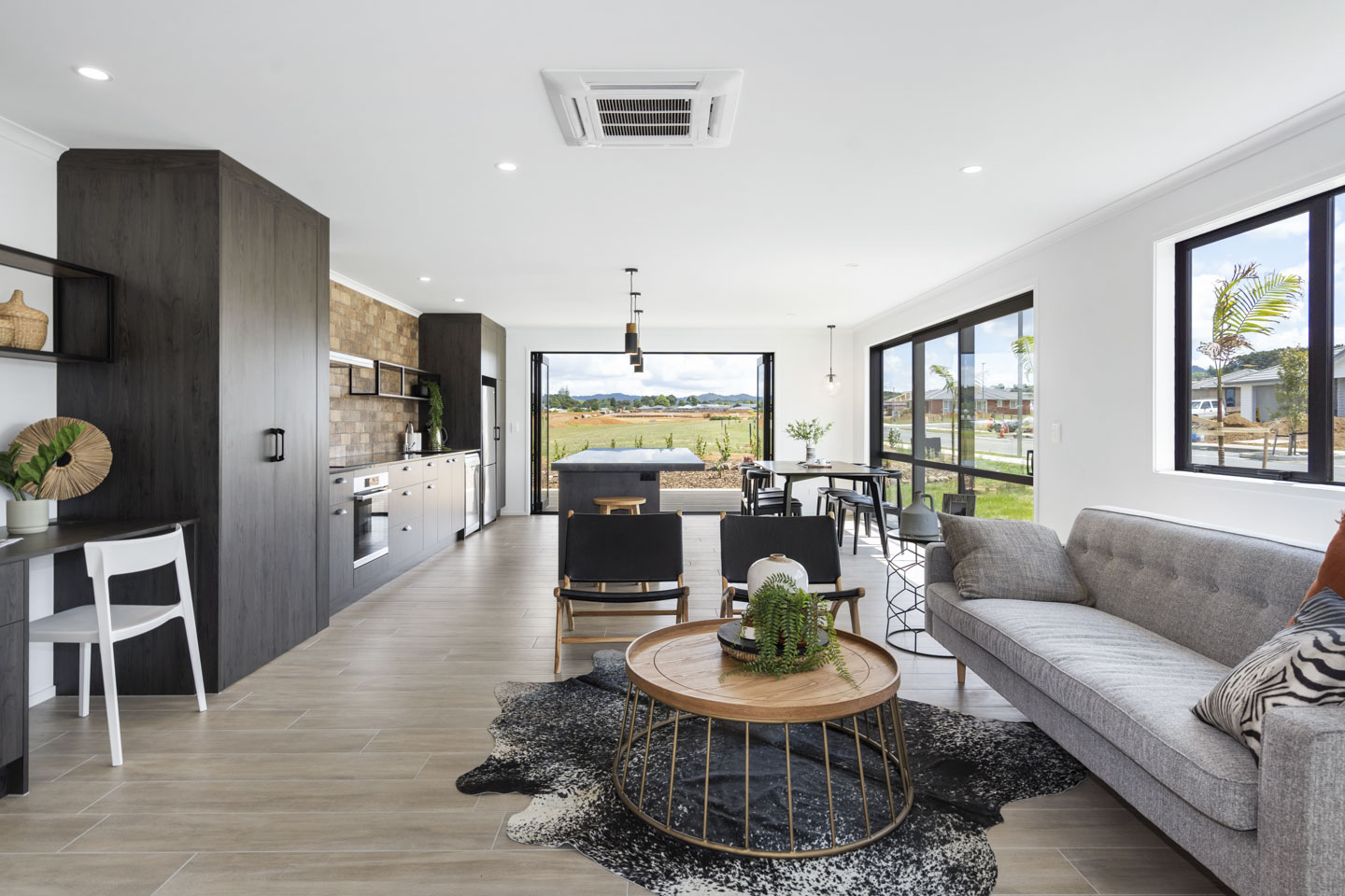 Open plan kitchen living and dining area in the Classic Builders Whangarei Showhome